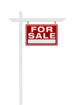 a red and white for sale sign on a pole