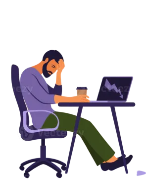 a man sitting at a desk with his laptop