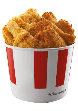 a bowl of fried chicken sitting on a table