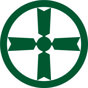 a green cross in the center of a circle