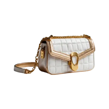 a white and gold cross body bag