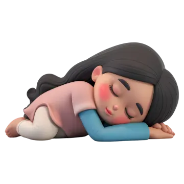 a little girl laying down on her stomach