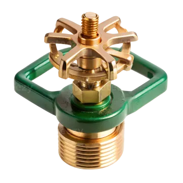 a brass - plated propor with green handle