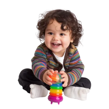 a small child is playing with a toy