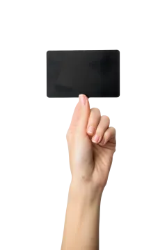 a hand holding a black credit card