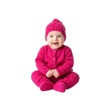 a baby sitting on the floor wearing a pink sweater and hat