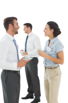 two men and a woman in business attire talking