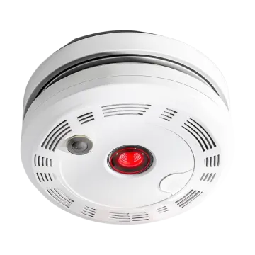 a white smoke detector with red light