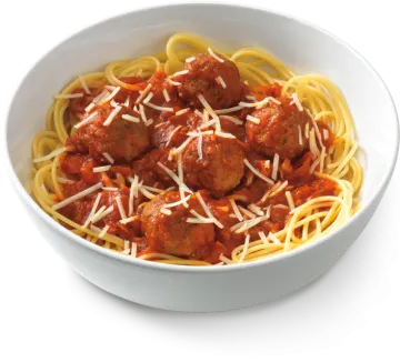 a white bowl filled with spaghetti and meatballs