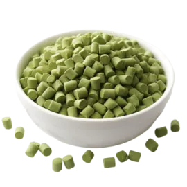 a white bowl filled with green peas