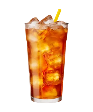a tall glass filled with ice and a yellow straw