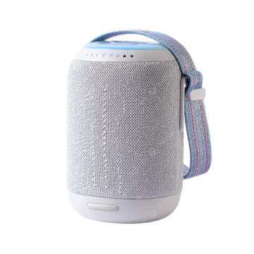 a white and blue portable speaker with a strap around it