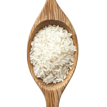 white rice in a wooden spoon on a white background