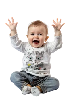 a baby sitting on the floor with his hands up
