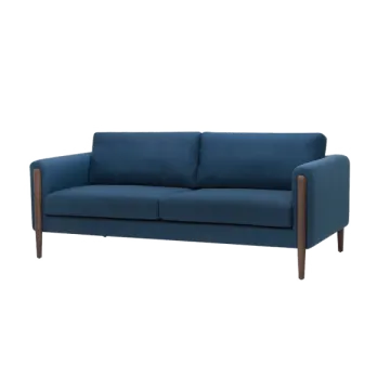 a blue couch with wooden legs and arms
