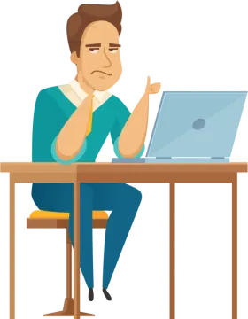 a man is sitting at the table and working on his laptop