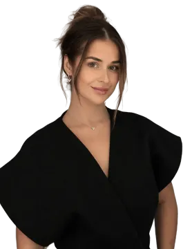 a woman wearing a black wrap top