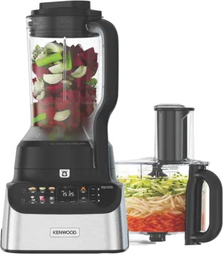 an image of a blender with vegetables in it