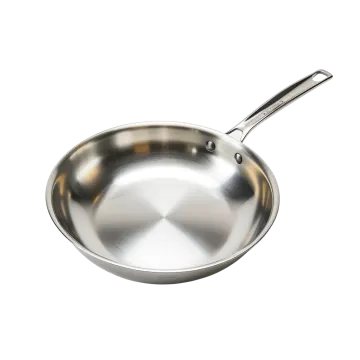 an empty frying pan on a white background