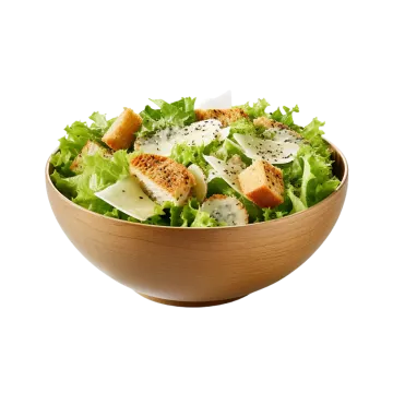 a salad in a wooden bowl on a white background