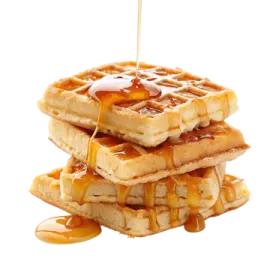 a stack of was with syrup on top