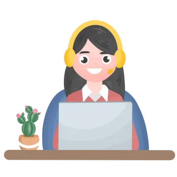 a woman sitting at her desk with a laptop