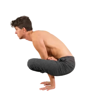 a man doing a yoga pose against a white background