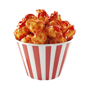 a red and white striped paper cup filled with popcorn