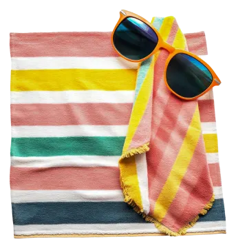 a pair of sunglasses and a towel on a white background