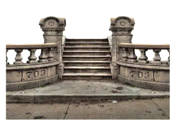an old stone staircase with steps leading up to it