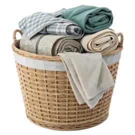 a basket filled with towels and blankets