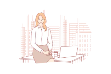 a woman sitting at her desk in front of a laptop