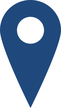 a blue pin with a white circle on it