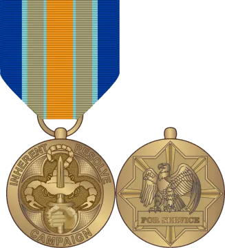 a medal with an eagle on it