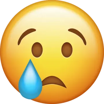 a sad face with a tear on it