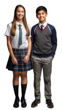 two children in school uniforms posing for the camera