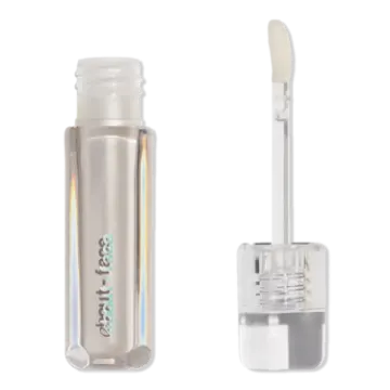 a white lip with a silver lid and a clear lip