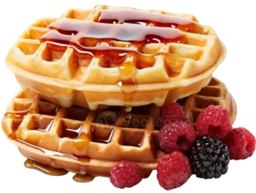 a stack of was with syrup and berries