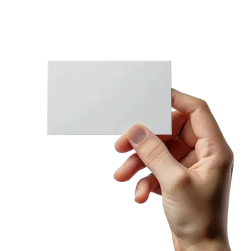 a hand holding a white business card