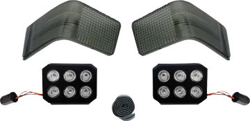 a pair of leds on the left side of a vehicle
