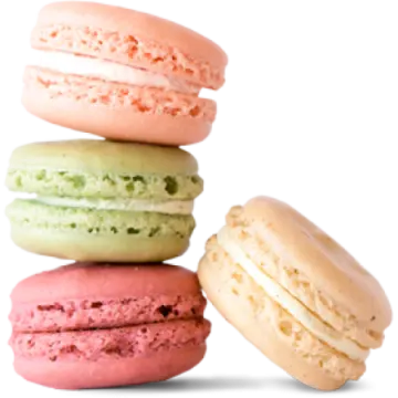 a stack of colorful macaros on white background