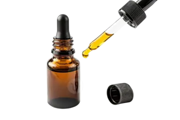 a bottle of essential oil with a dropper