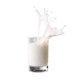 a glass filled with milk and splashing