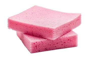 three pink sponges on white background