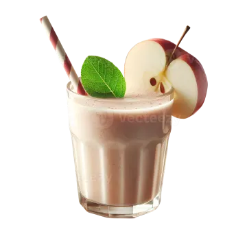 a glass filled with a drink and an apple