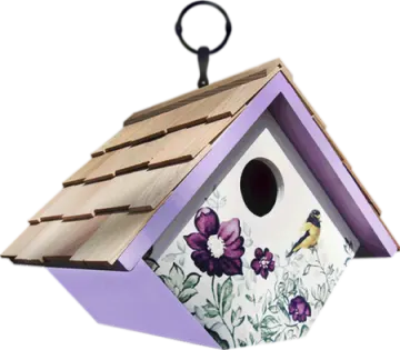 a bird house with purple flowers on it