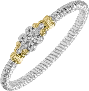 a white and yellow gold bracelet with diamonds