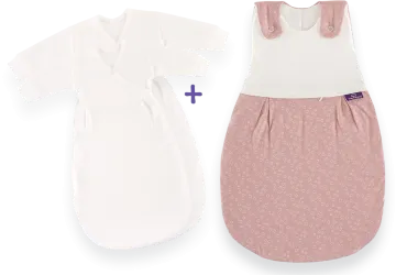 a white and pink baby gown next to an infant's bodysuit