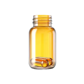 a glass jar filled with pills