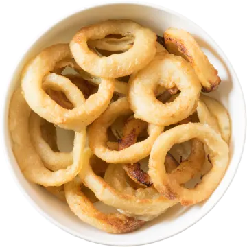 a bowl of onion rings on a white background